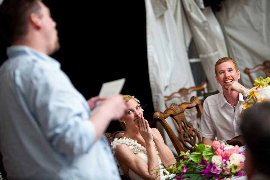Listening to speeches :: Hawaii Wedding Photography by infusedstudios.ca