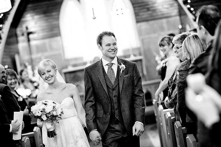 Coming down the aisle :: Canmore Wedding Photography by infusedstudios.ca
