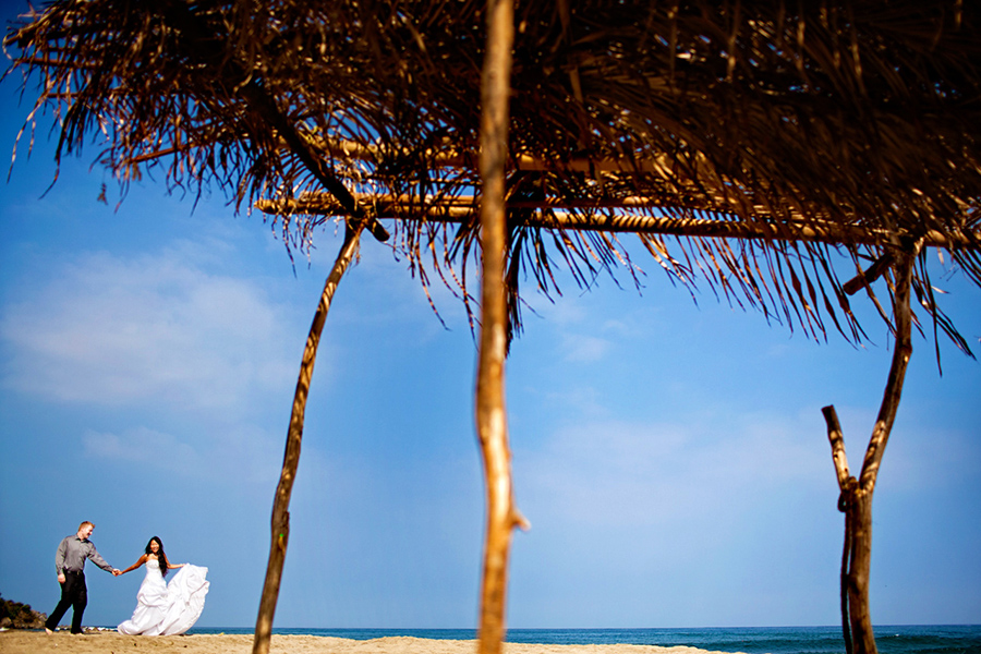 Walking along the beach :: Destination Wedding Photography by infusedstudios.ca