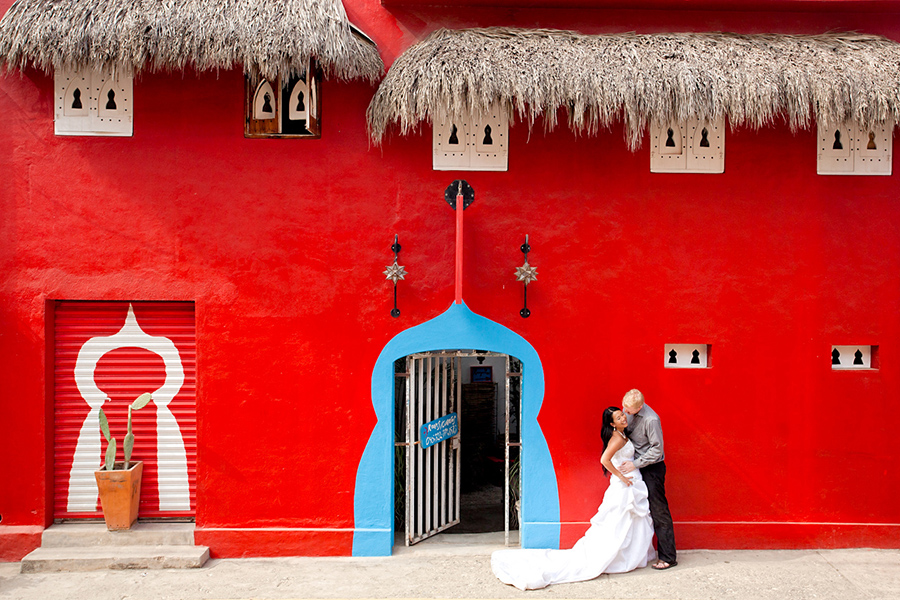 Red building background :: Destination Wedding Photography by infusedstudios.ca