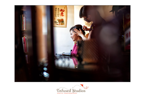 Bride having hair done