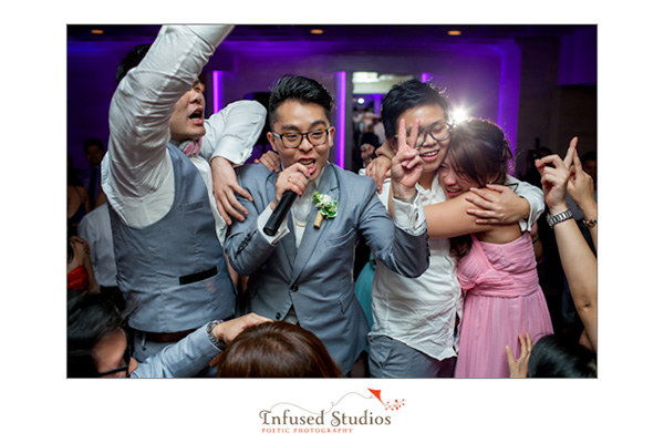 Groom performing during wedding reception