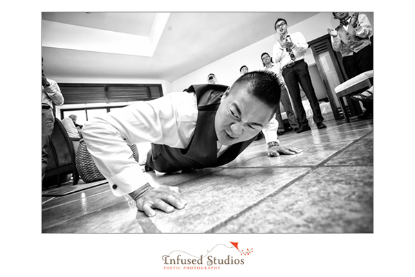 Groomsman doing push ups