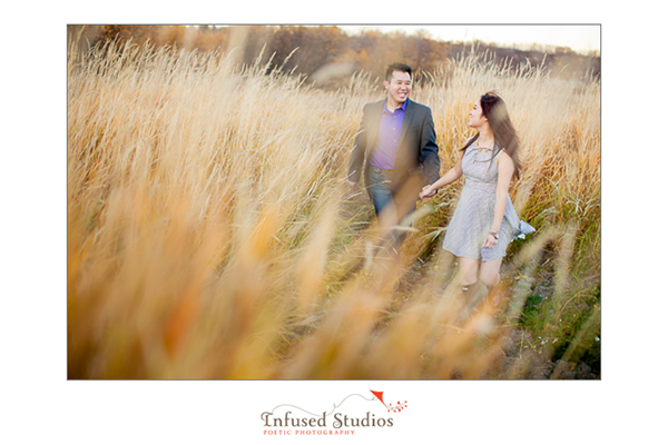 Engagement photo - walking through tall grass