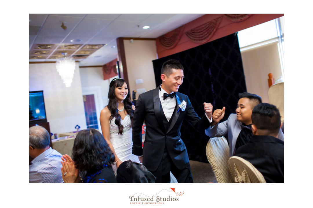 Edmonton Wedding Photographers :: Natalie + Mai entering reception