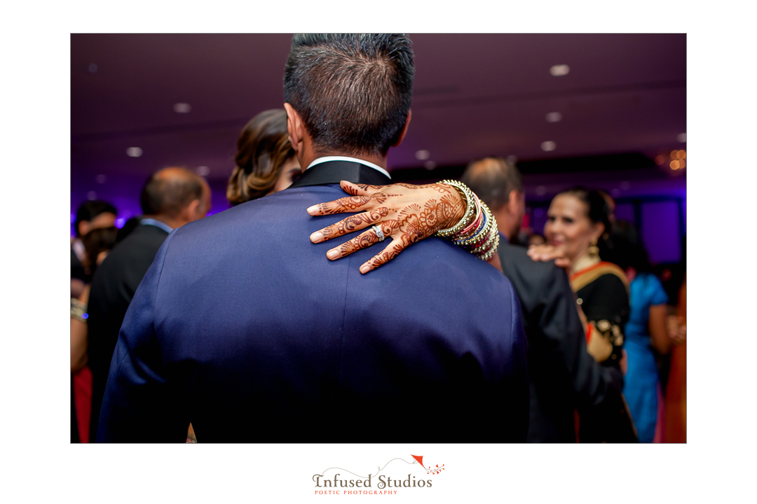 Artistic Edmonton wedding photographers :: mehndi hand on back
