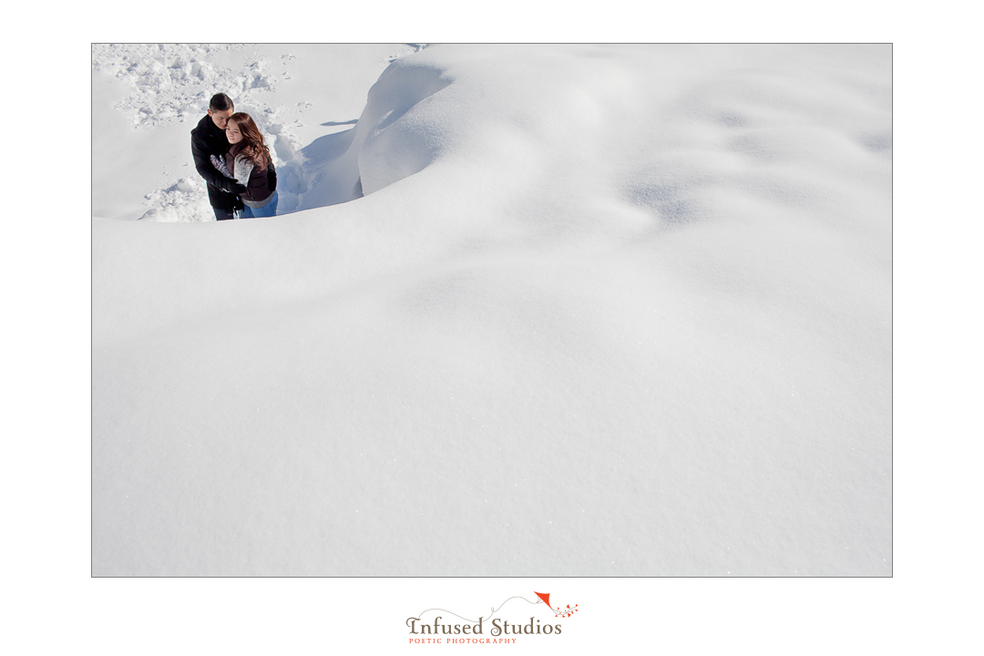 Snowy landscape engagement photography in Jasper