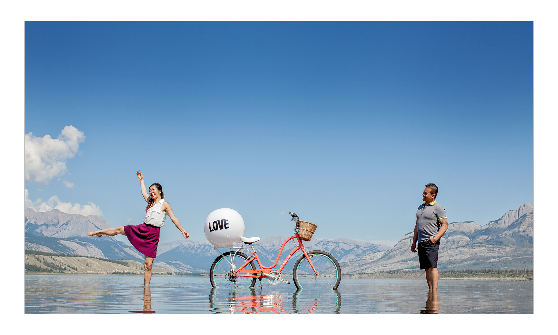 Award winning engagement photography album :: pgs 7-8 Bicycle on lake