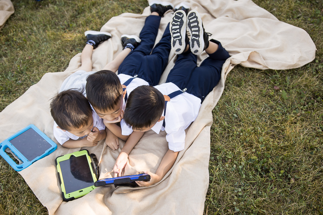 Edmonton family photo ideas - vow renewal with kids entertained on iPad during set up