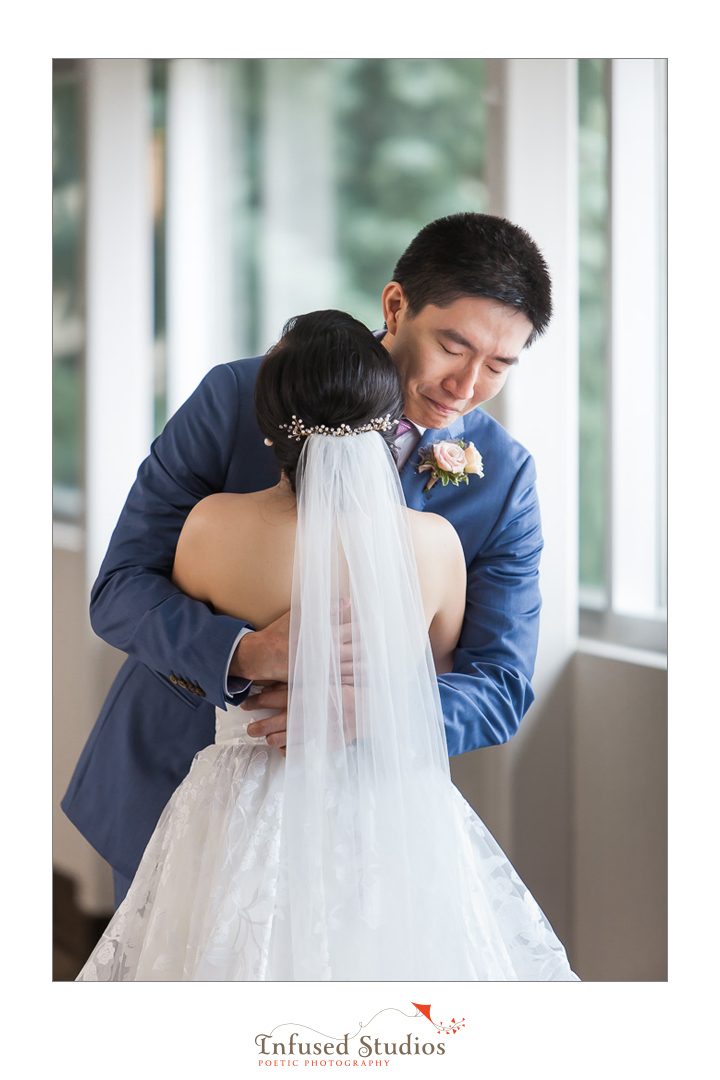 wedding day first look by Calgary wedding photography by Infused Studios