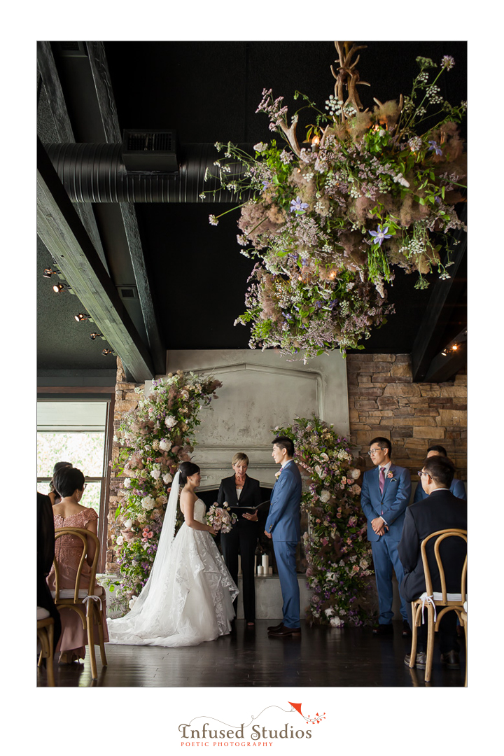 Wedding ceremony at The Lake House Calgary by Calgary wedding photographers Infused Studios